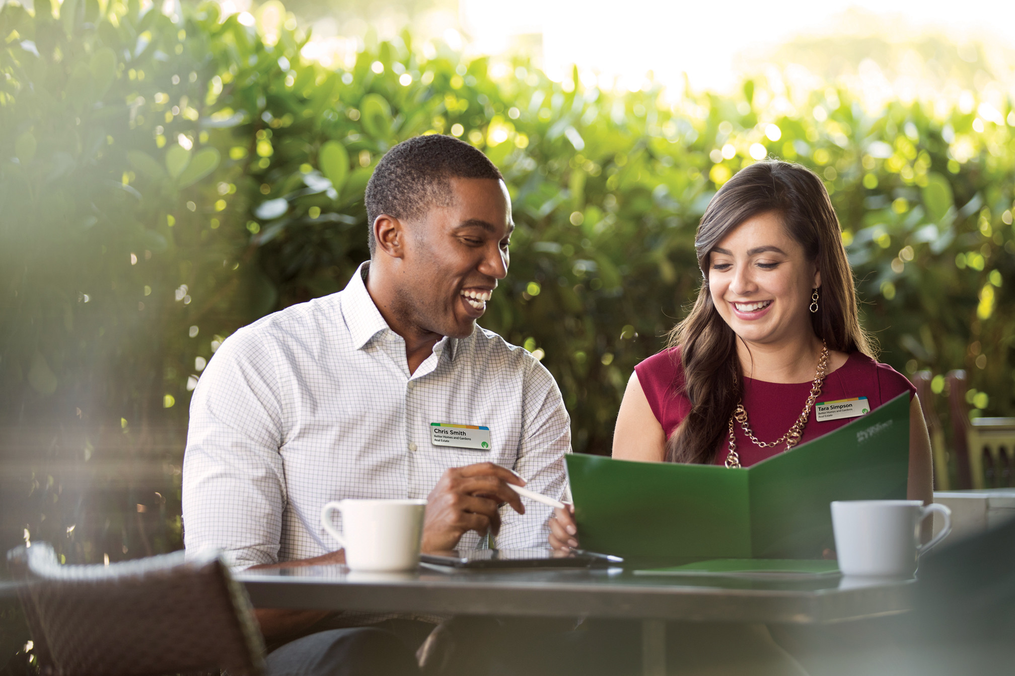 Two agents discussing Abilene real estate