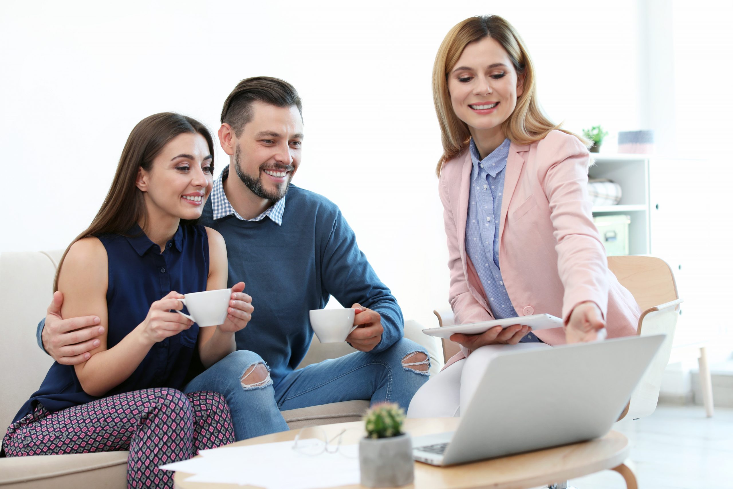 REALTOR discussing with couple