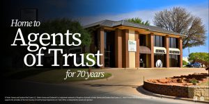 Modern Better Homes and Gardens Real Estate Senter, REALTORS® office building in Abilene, Texas with “Home to Agents of Trust for 70 years” branding overlay, representing trusted local real estate service and community roots.